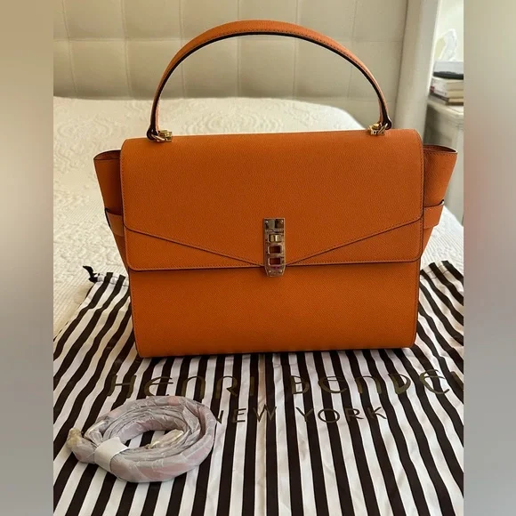 HENRI BENDEL Uptown Orange Leather Turnlock Top Handle Flap Satchel Bag